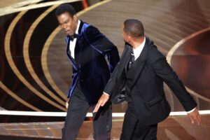 Oscar, all’Italia nemmeno una statuetta: Zelensky non interviene e Will Smith dà un pugno in faccia a Chris Rock