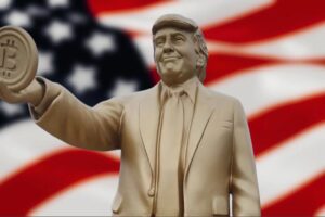 Capitol Hill, spunta una statua dorata di Trump con un Bitcoin: provocazione crypto per aprire il dibattito